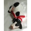 Black & White Ceramic Cow with Red Ribbon Around The Neck