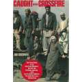 Caught in the Crossfire (Inscribed by Author) | Jan Goodman