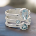 Triple Band Sterling Silver Ring with Cascading Blue Topaz Quartet