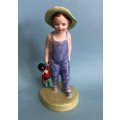Royal Doulton - Figurine (Boy with Doll)