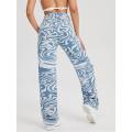 High-Waist Denim Pants with Blue Swirl Print  Stylish Wavy Ripple Graphic, Zipper Button Closu...