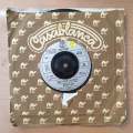 Status Quo  What You're Proposing - Vinyl 7" Record - Very-Good+ Quality (VG+) (verygoodplus7)
