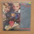 Jona Lewie  Love Detonator - Vinyl 7" Record - Very-Good+ Quality (VG+) (verygoodplus7)