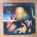 Wishbone Ash  Nouveau Calls (with IRS original booklet) -  Vinyl LP Record - Very-Good+ Qualit...