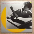John McLaughlin  Music Spoken Here - Vinyl LP Record - Opened  - Very-Good+ Quality (VG+)