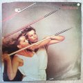 Roxy Music - Flesh and Blood - Vinyl LP Record - Opened  - Very-Good Quality (VG)