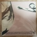 Medium Medium  The Glitterhouse - Vinyl LP Record - Very-Good+ Quality (VG+)