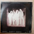 Kiss  Dressed To Kill  Vinyl LP Record - Very-Good+ Quality (VG+)