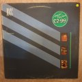 10cc  Windows In The Jungle (UK) - Vinyl LP Record - Very-Good+ Quality (VG+)