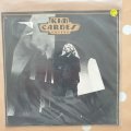 Kim Carnes  Voyeur - Vinyl 7" Record - Very-Good+ Quality (VG+)