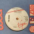 Skids  Working For The Yankee Dollar - Vinyl 7" Record - Very-Good+ Quality (VG+) (verygoodplus)