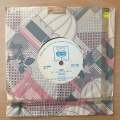 Santana  She's Not There (Rhodesia) - Vinyl 7" Record - Very-Good+ Quality (VG+) (verygoodplus)