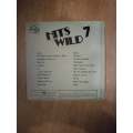 Hits Wild 7 - Vinyl LP Record - Opened  - Very-Good Quality (VG)