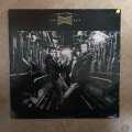 Dominoe - The  Key - Vinyl LP Record - Opened  - Very-Good+ Quality (VG+)