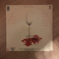 Dan Fogelberg - Exiles - Vinyl LP Record - Very-Good+ Quality (VG+) (verygoodplus)