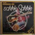 Also Hooked On Sakkie Sakkie -  Vinyl LP Record - Opened  - Very-Good Quality (VG)