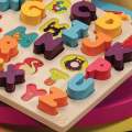 B. Toys Alpha. B. Tical Wooden Alphabet Puzzle - Picture Background
