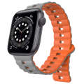 For Apple Watch 6 40mm Reverse Buckle Two Color Magnetic Silicone Watch Band(Grey+Orange)