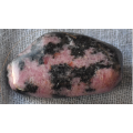 Large Rhodonite Flat stone Restores physical and emotional strength when it is depleted.