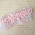 wedding lacey garter with pink satin ribbon