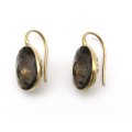 18K gold smokey quartz earrings by designer Pomellato.