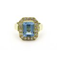 18kt gold blue topaz and diamond ring.