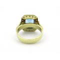 18kt gold blue topaz and diamond ring.