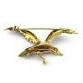 18K gold diamond and enamel "Bird in flight" brooch.