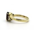 18K gold garnet and diamond ring.