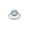 14K gold blue topaz and diamond ring by Browns.