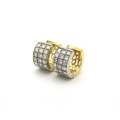 18K gold diamond huggie earrings.