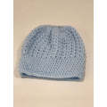 Hand knitted beanie with pony tale hole and boot cuffs