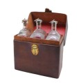 Set of three Glass Decanters with Leather Holder