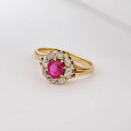 18ct Gold Central Ruby and Diamond Ring