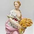 Meissen Figurine Of A Lady Holding Wheat