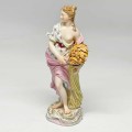 Meissen Figurine Of A Lady Holding Wheat