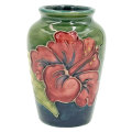 Moorcroft Hibiscus Urn Vase On Green Ground