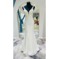 April, crepe mermaid with lace detailed bodice wedding dress.