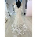 Heather, long sleeve lace detail fit and flare wedding dress.