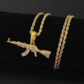 Golden AK47 Machine Gun pendant encrusted in Zirconia Jewels