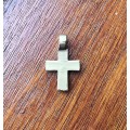 Metal cross pendant with decorative stones