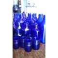 Hoard of vintage cobalt glass bottles and jars