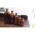 Vintage amber poison bottles sequentialset of 5