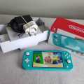 Nintendo Switch Lite Console +Original charger and Box