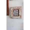 Reclaimed porcelain mosaic on tile in a salvaged Oregon pine frame
