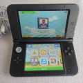 Nintendo 3ds XL console with original charger, stylus and memory card