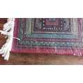 Small hand knotted Persian table rug