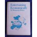 Entertaining economically by Marguerite Patten