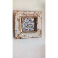 Reclaimed porcelain mosaic on tile in a salvaged Oregon pine frame
