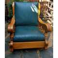 Mid century solid oak and leather rocking chair for sale